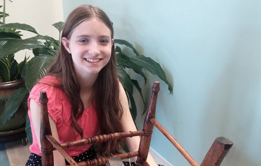Kristin Jurewicz demostrates chair caning