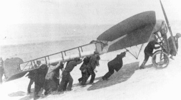 Local fisherman roll Harriet's plane two miles to the hangar
