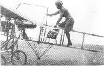 Harriet climbs aboard her plane