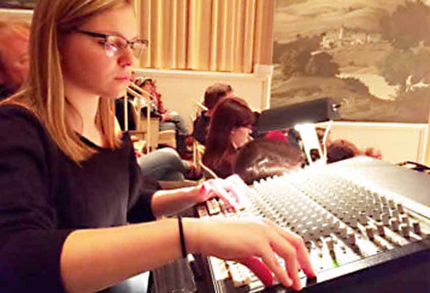 Emily Hardy doing sound in Daniel Recital Hall