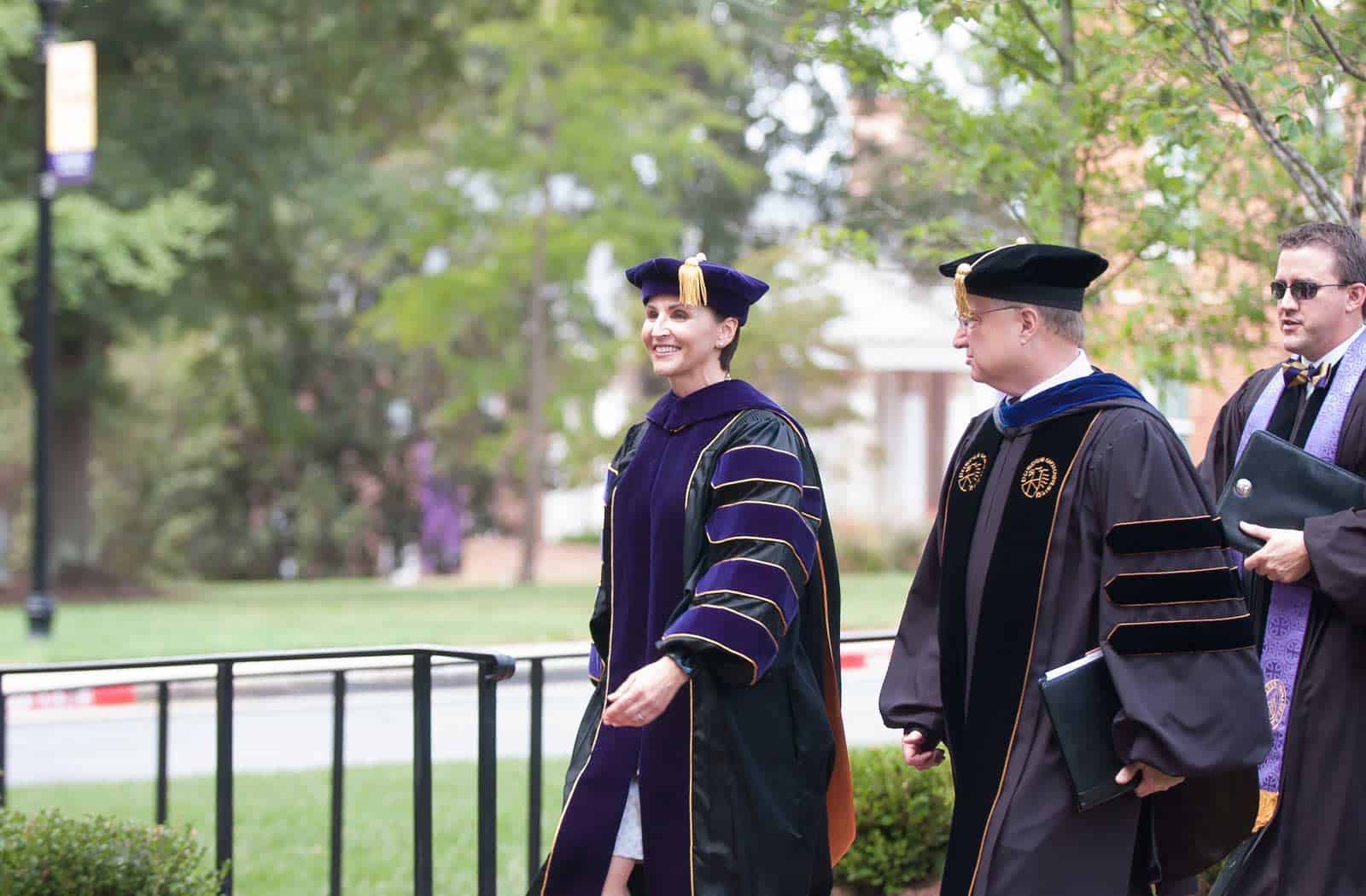President Newkirk leads the processional through Johnson Plaza
