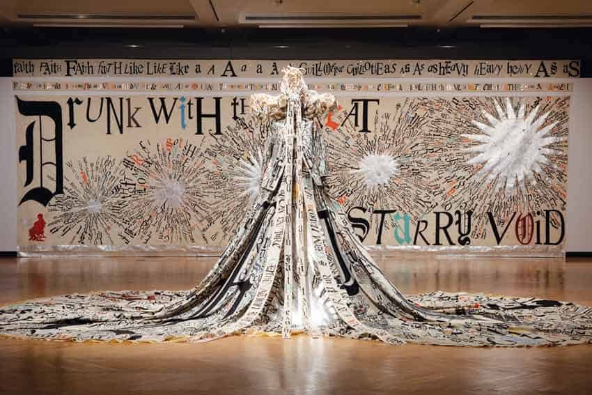 Install shot of Big Gal Faith from Lesley Dill's traveling exhibition Faith & the Devil. Taken 2014 at Clay Center for the Arts and Sciences, Charleston.