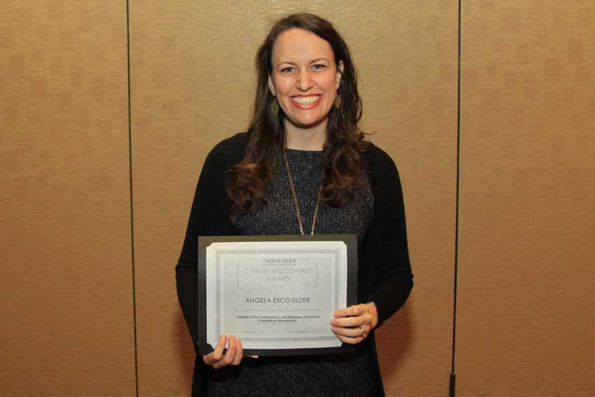 Dr. Elder displays her award for best dissertation on Southern History from the Southern Historical Association
