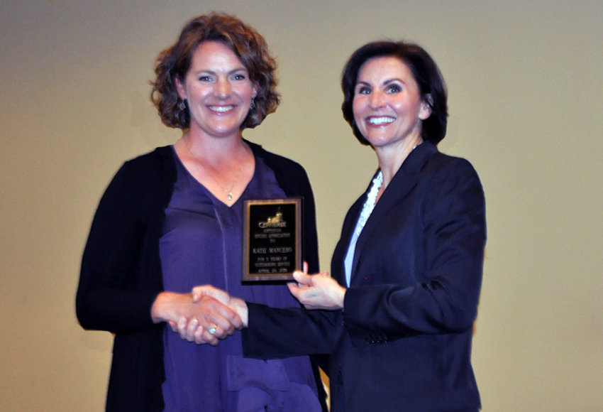 President Newkirk presents Converse faculty and staff members with service awards