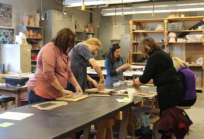 Professor Carlisle teaches a ceramics workshop