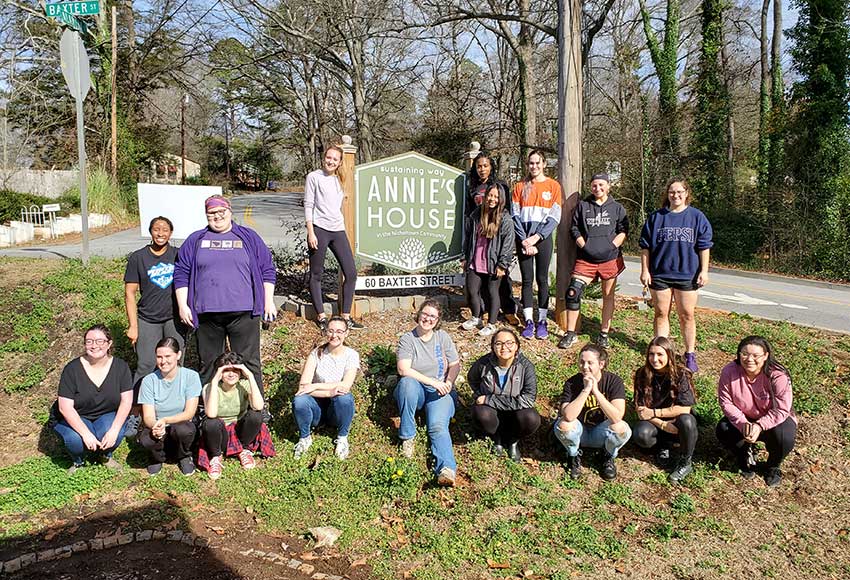 Converse Chemistry students at Annie's House in Greenville