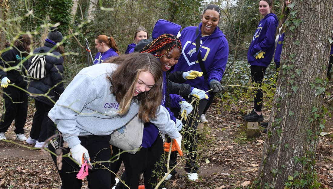 Converse students clean up outdoors for day of service