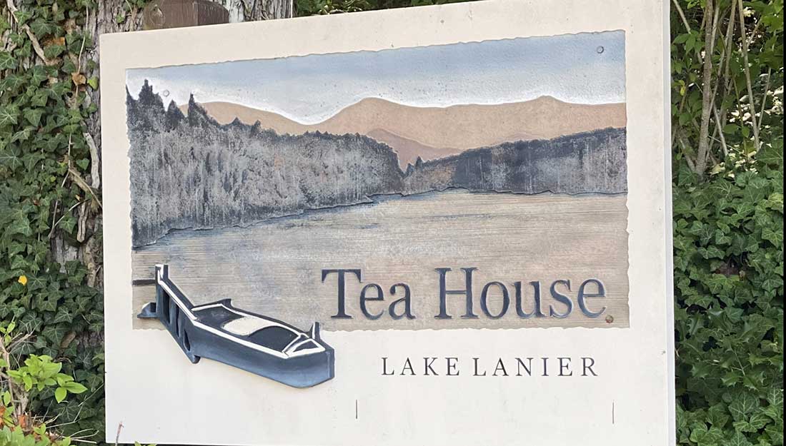 Photo of the outdoor sign for the entrance of the Tea House at Lake Lanier.