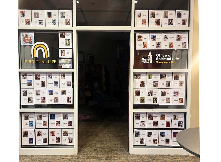 Front view of the Spiritual life office with photos of Converse students and employees pets.